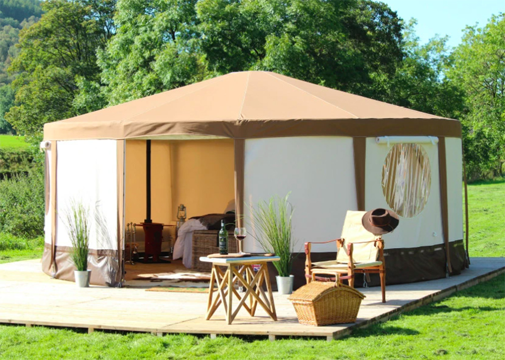 This image has an empty alt attribute; its file name is Glamping-Yurt.jpg